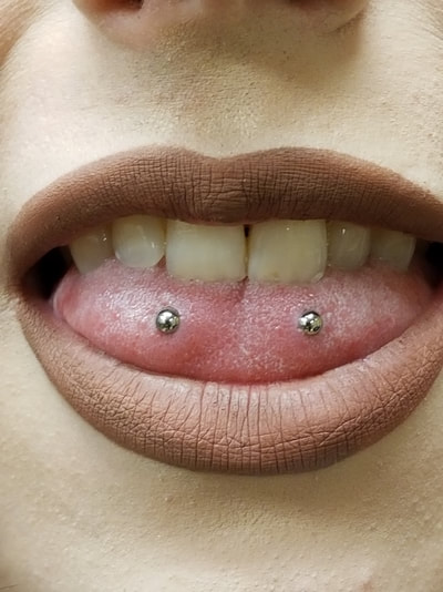 tongue surface piercing Infusion Studio