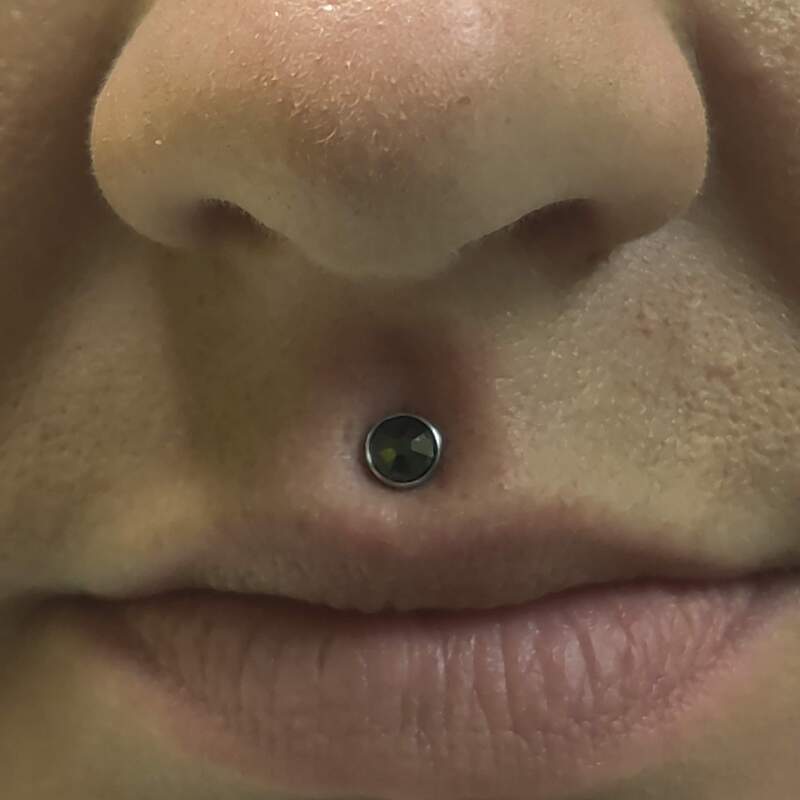 Medusa lip piercing by Dylan Larsen Saint D Infusion Studio LLC WA